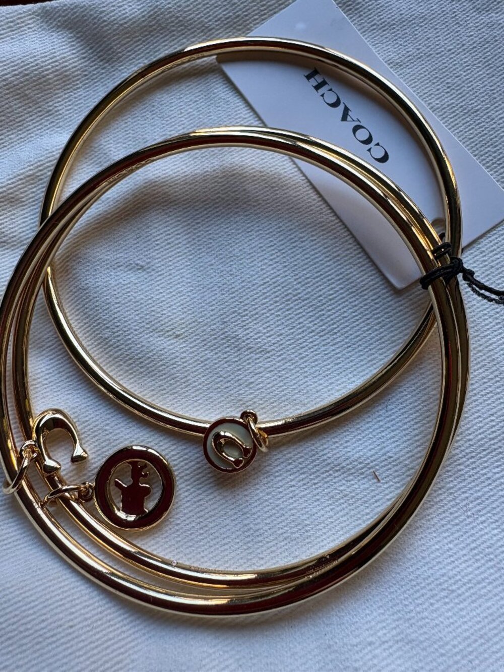 Coach gold charm bracelet